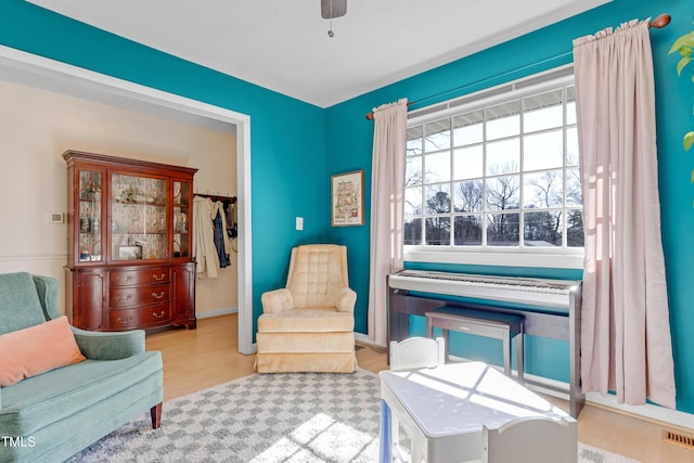 sitting room with light wood-type flooring