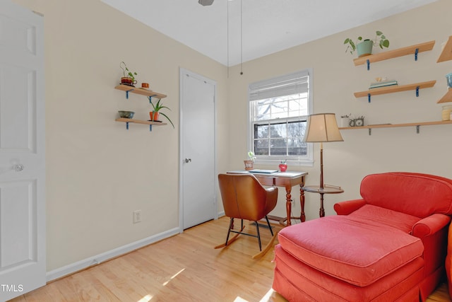 sitting room featuring light hardwood / wood-style floors