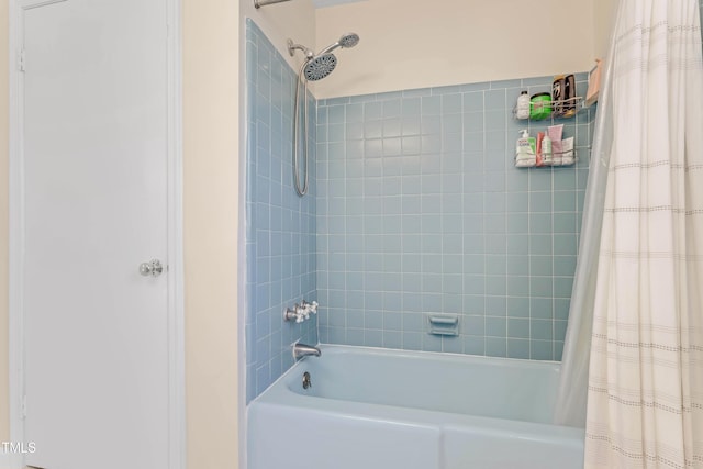 bathroom with shower / tub combo