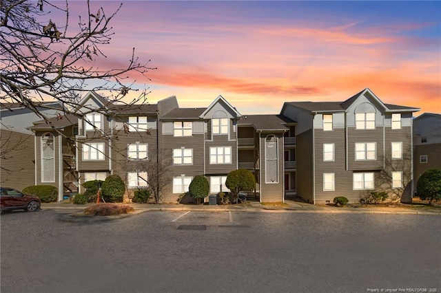 view of outdoor building at dusk