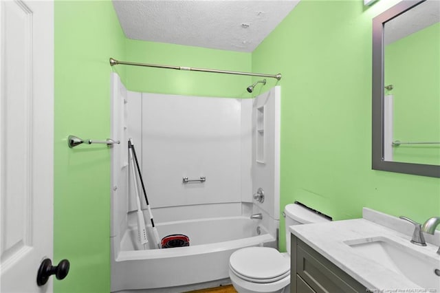 full bathroom with vanity, toilet, shower / bathing tub combination, and a textured ceiling