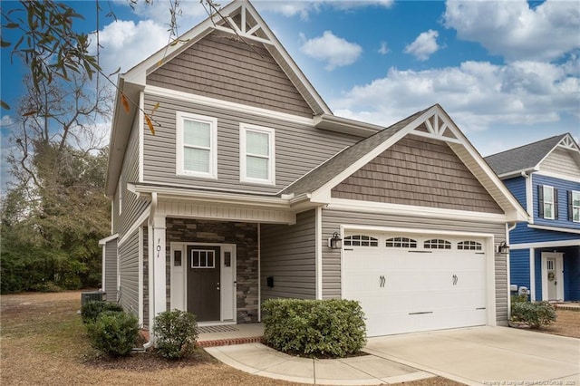 craftsman house with a garage