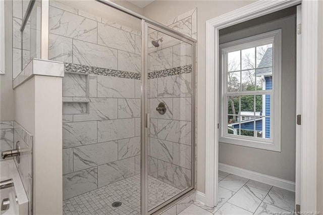 bathroom with a shower with shower door