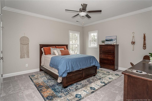 bedroom with crown molding, ceiling fan, and carpet