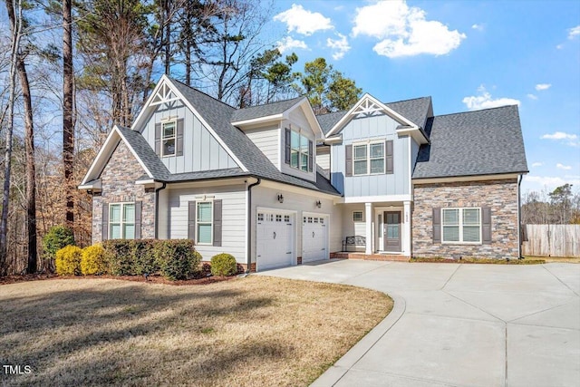 view of front of home with a garage and a front lawn