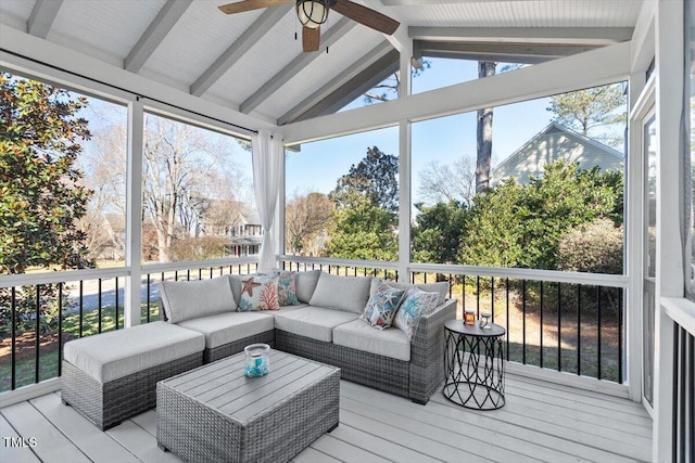 sunroom / solarium with vaulted ceiling with beams and ceiling fan