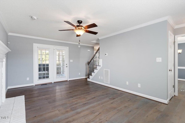 unfurnished living room featuring ornamental molding, dark hardwood / wood-style floors, and a textured ceiling