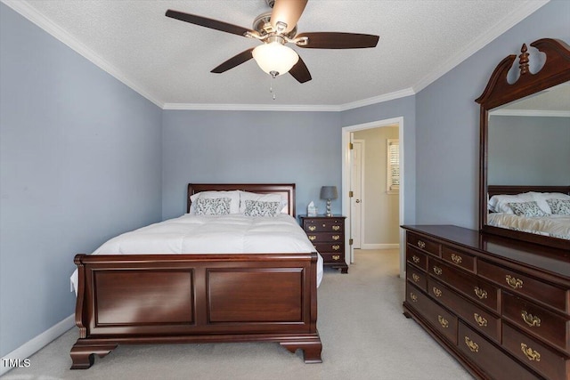 carpeted bedroom featuring ceiling fan, crown molding, and a textured ceiling