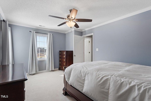 carpeted bedroom with ceiling fan, crown molding, and a textured ceiling