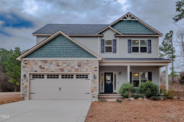 craftsman house featuring a garage and a porch