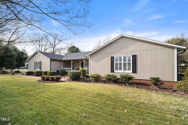 ranch-style house with a front yard