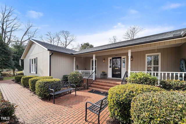 view of front of home featuring covered porch