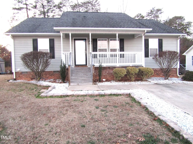 single story home featuring a porch