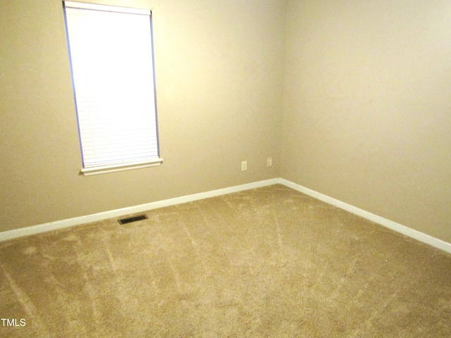 view of carpeted spare room