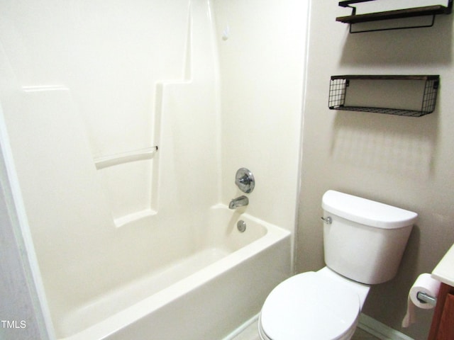 bathroom with toilet and shower / bathing tub combination