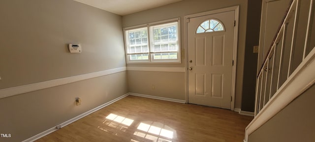 entrance foyer with light hardwood / wood-style floors