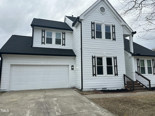 front of property featuring a garage