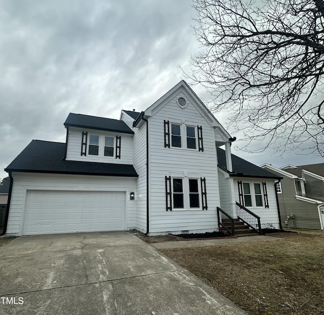 front of property with a garage and a front yard