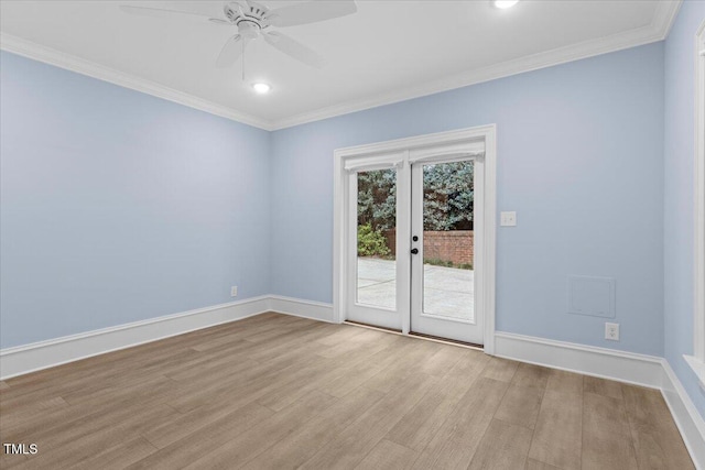 unfurnished room with baseboards, light wood finished floors, and crown molding