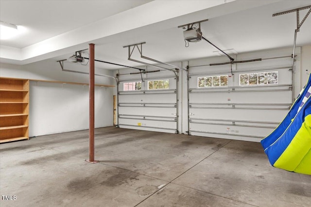 garage featuring a garage door opener