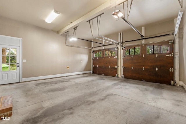 garage featuring baseboards