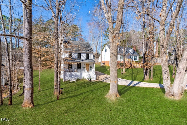 view of yard with a porch