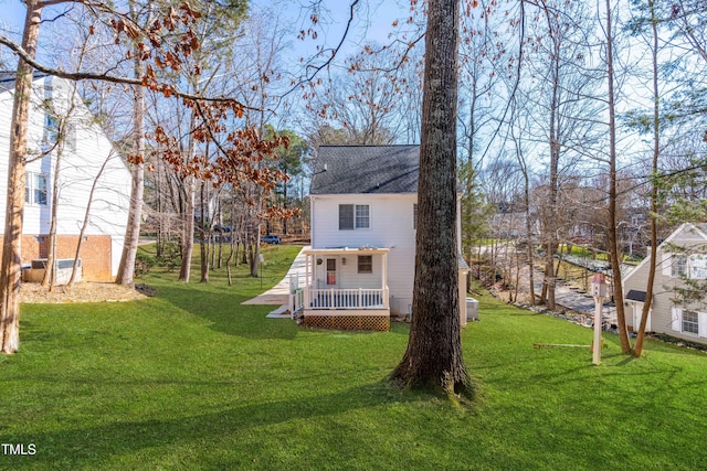 view of yard featuring a wooden deck