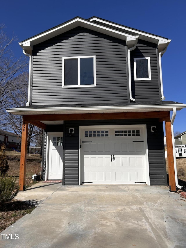 view of front of house with a garage