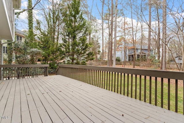 wooden deck with a yard