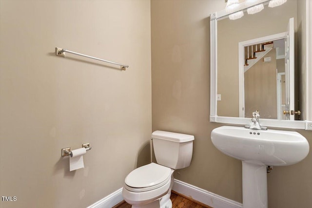 bathroom featuring toilet