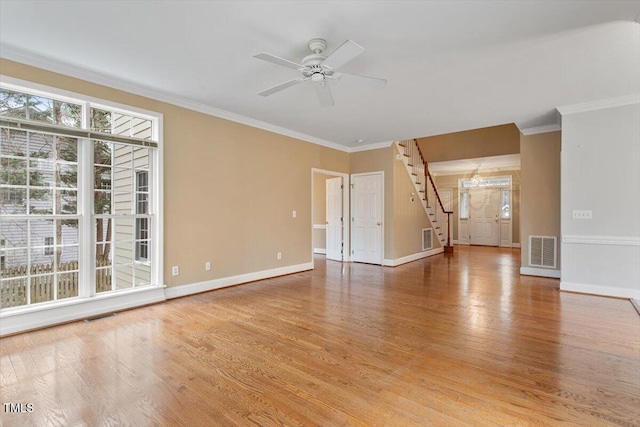 unfurnished living room with ornamental molding, hardwood / wood-style floors, and ceiling fan