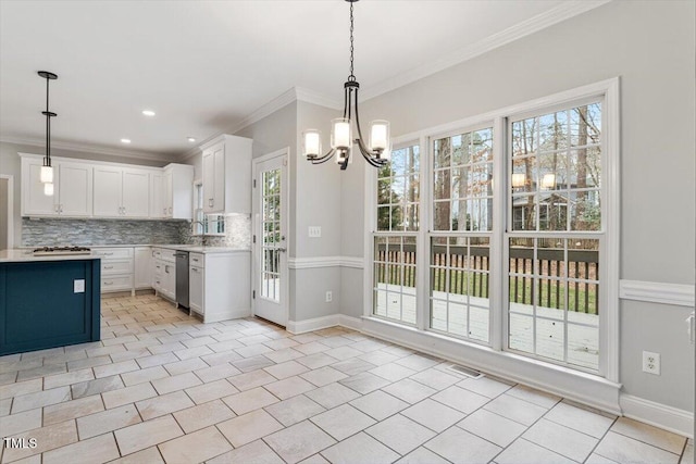 kitchen featuring pendant lighting, light tile patterned floors, dishwasher, white cabinetry, and backsplash