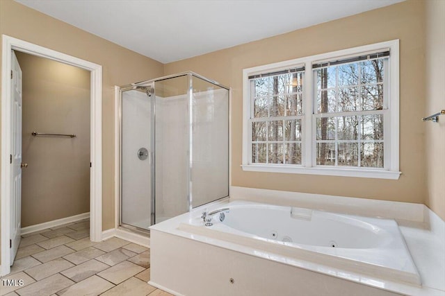 bathroom with independent shower and bath