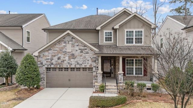 craftsman house featuring a garage and covered porch