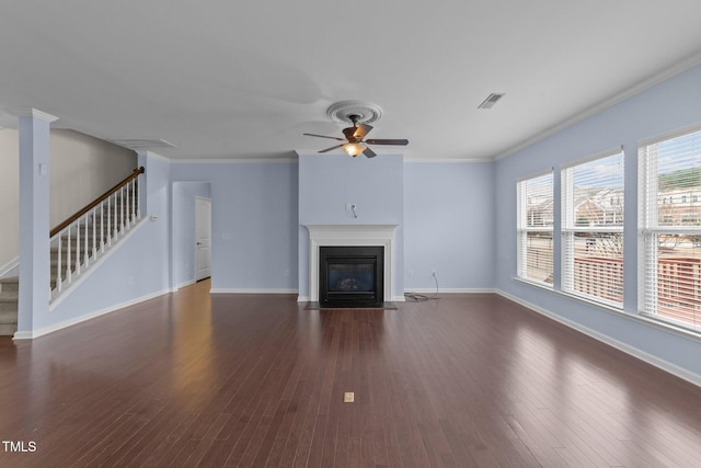 unfurnished living room with ornamental molding, dark hardwood / wood-style floors, and ceiling fan