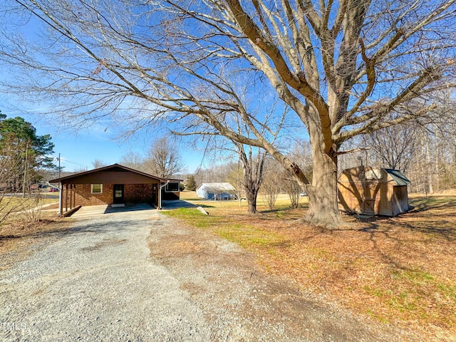 exterior space with a carport