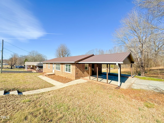 single story home with a carport and a front yard