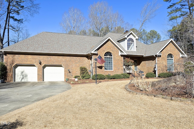 view of front of home featuring a garage and covered porch