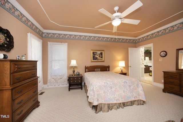 bedroom with light carpet and ceiling fan