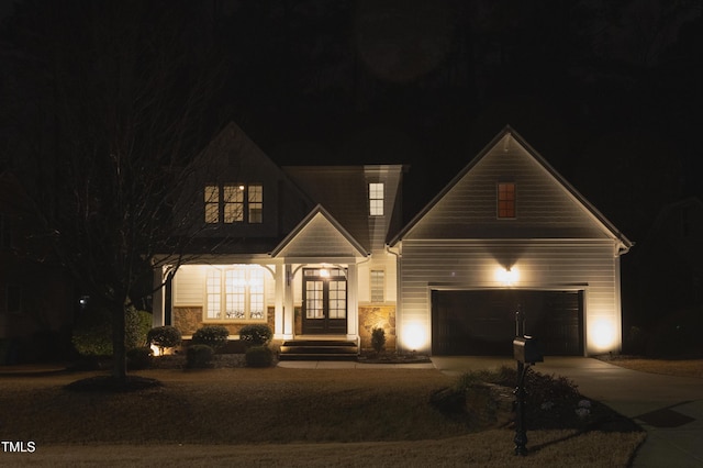 view of front facade featuring a garage and french doors