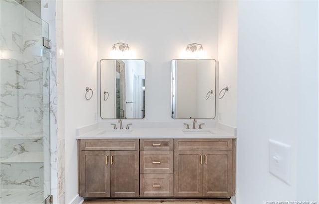 bathroom featuring vanity and walk in shower