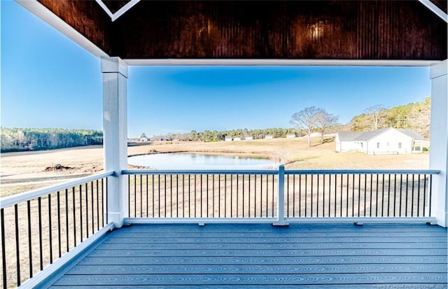 deck featuring a water view