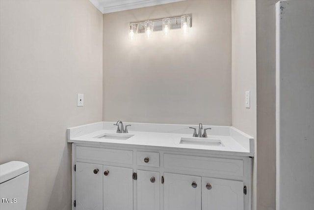 bathroom with vanity and toilet