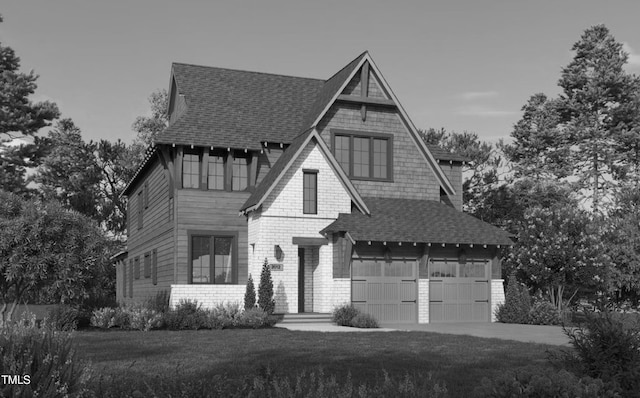 view of front facade with a garage and a front yard