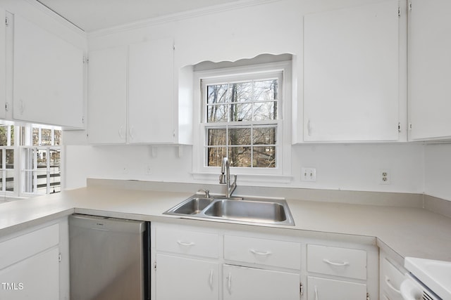 kitchen featuring a sink, white cabinetry, light countertops, and stainless steel dishwasher