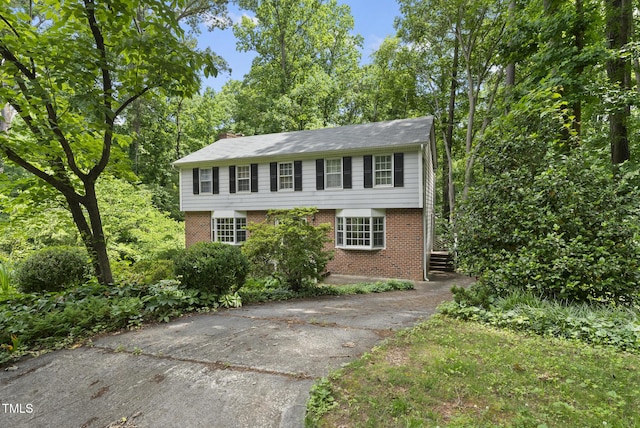 2004 Beecham Cir, Raleigh, NC 27607 - colonial house featuring brick siding