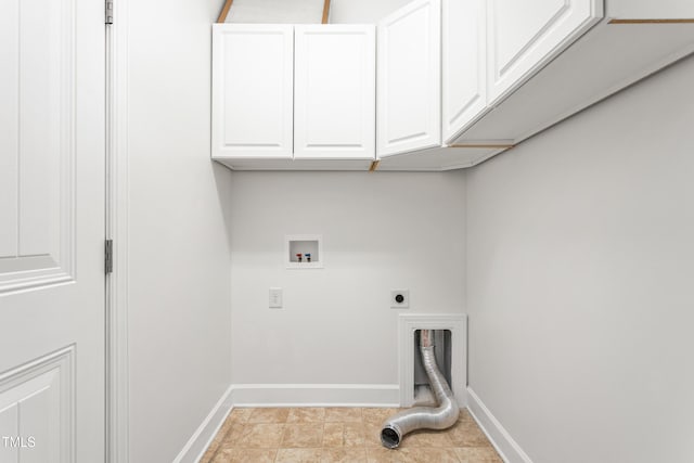 laundry room with cabinets, electric dryer hookup, washer hookup, and light tile patterned floors