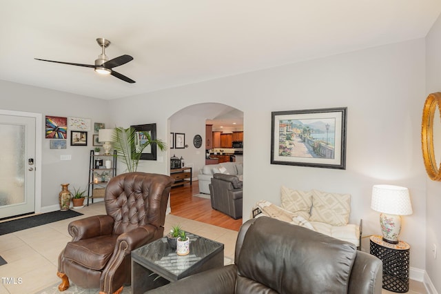 living room featuring ceiling fan