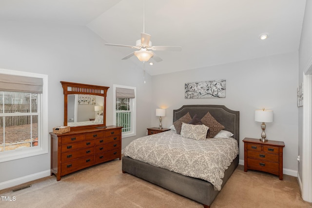 bedroom featuring high vaulted ceiling, light carpet, and ceiling fan