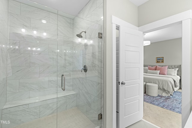 bathroom with a shower with shower door